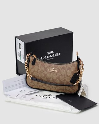 Жіноча сумка Coach Teri Shoulder Bag In Signature Canvas Premium фото