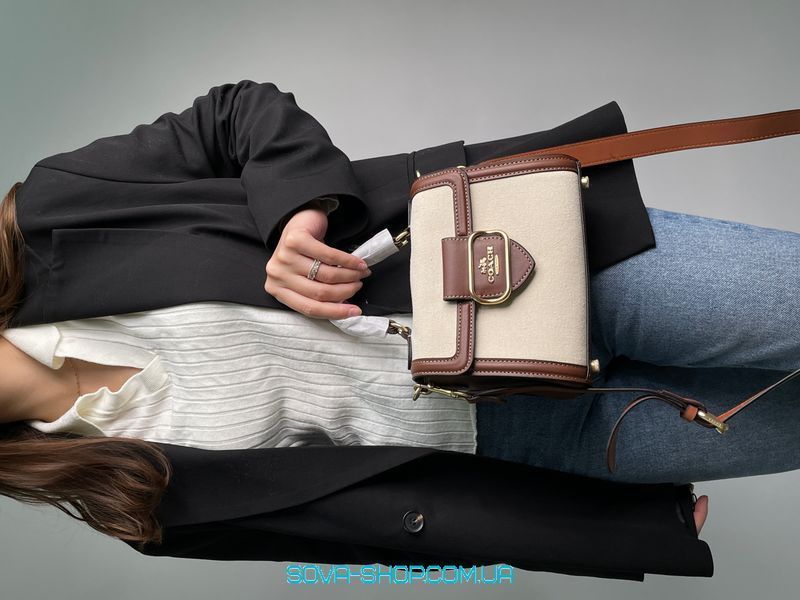Жіноча сумка Coach Hero Shoulder Bag in Signature Canvas Premium фото