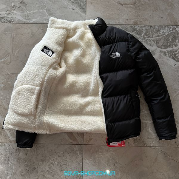 Двухсторонняя зимняя куртка THE NORTH FACE фото