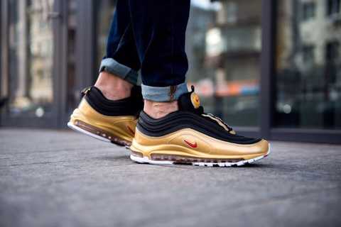 Black and best sale gold nike 97