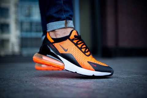 White and orange nike air store max 270