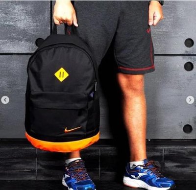Рюкзак Air чорний с оранжевым вишитим знаком фото
