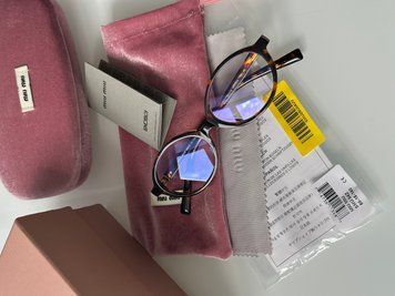 Сонцезахисні окуляри Miu Miu SMU56ZS 2VN-50K Gold Premium фото