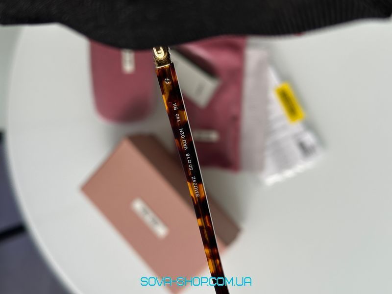 Сонцезахисні окуляри Miu Miu SMU56ZS 2VN-50K Gold Premium фото